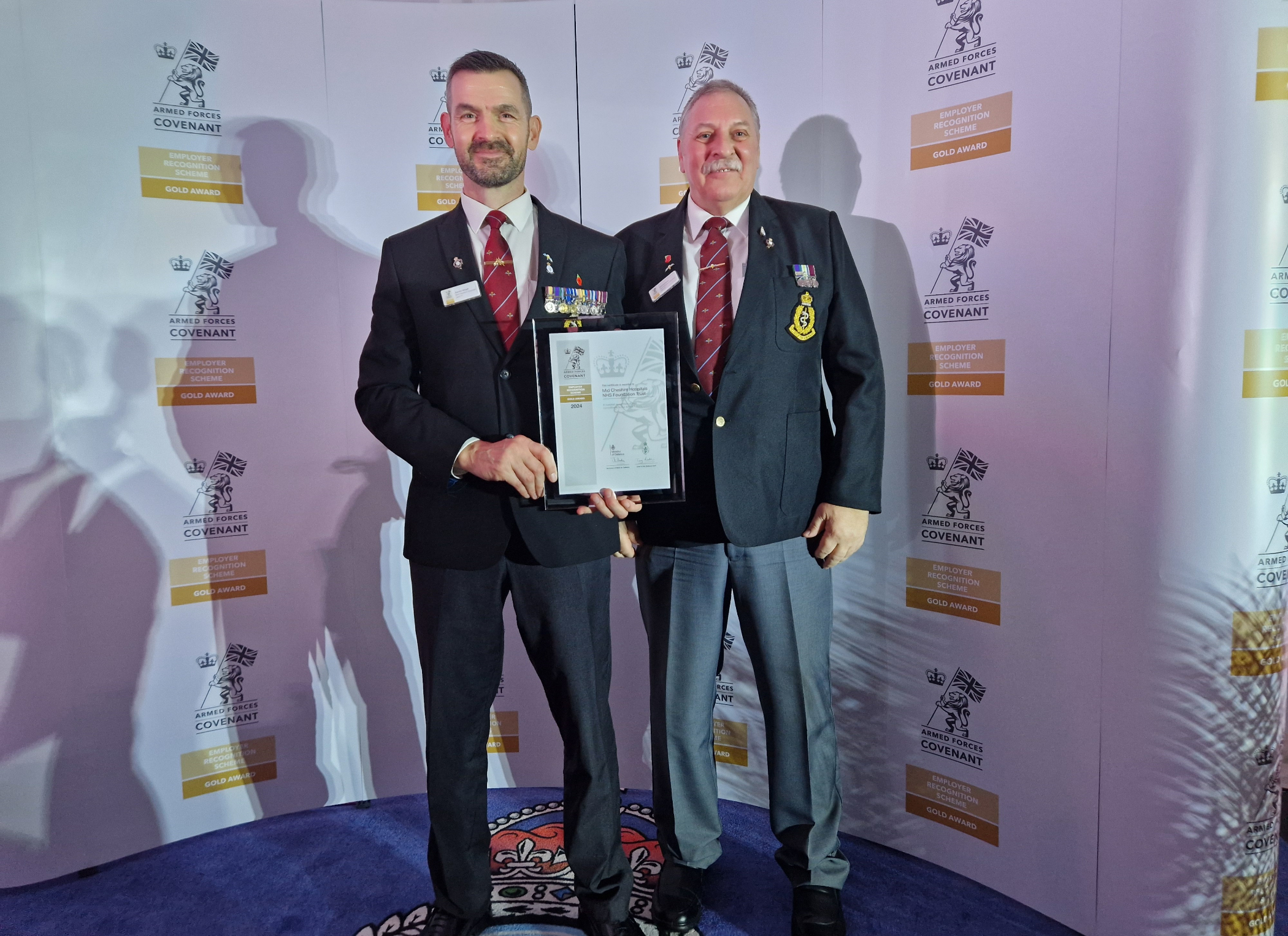 Darren Hough, left, and Clifford Forshaw at the Employer Recognition Scheme ceremony in the Royal Liver Building, Liverpool.